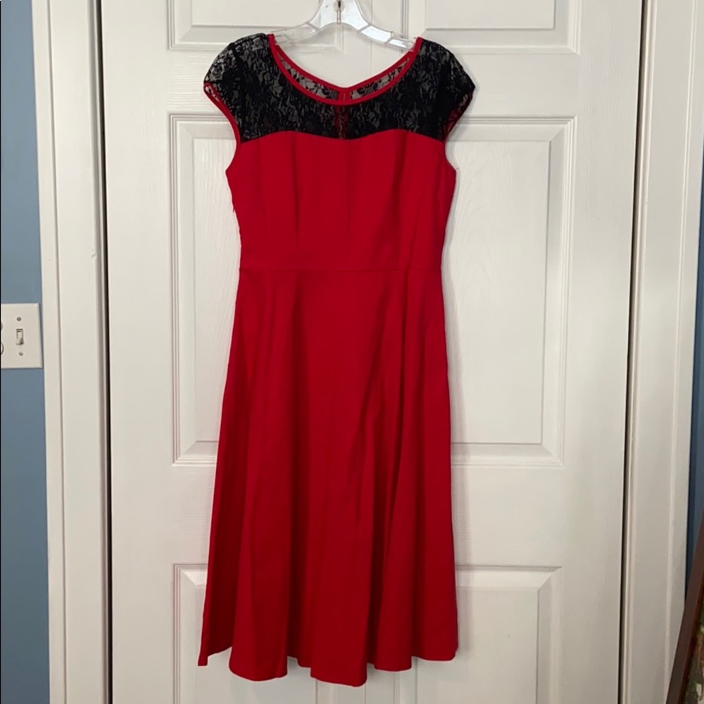 Black lace top and red A line dress